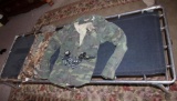 Folding Metal Spring Cots, Camo Gear, and Headlights