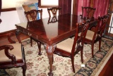 Incredible Elaborate Mohogany Claw-Foot Dining Table with Six Chairs and Additional Leaf