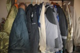 Rolling Garment Rack Filled with Men's Coats