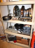 Plastic Storage Shelves with Contents like Bakeware and Enamelware