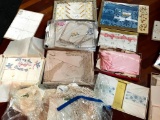 Mixed Textile Tablecloths, Napkins, and More in Knits, Laces, and Embroidered Designs