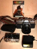 Minolta Film Camera SRT201, Rollei 35 Camera, and Vivitar 102 Flash