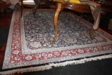 Detailed Red and Blue Floral Wool Area Rug Labeled 8' x 10'