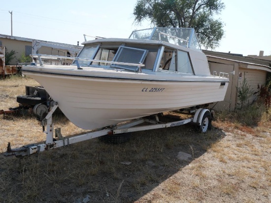 Steury Boat with 2 Liter Outboard Engine & Trailer