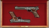 Extremely Rare and Fine Pair of Factory Engraved and Gold Inlaid Colt Woodsman Match Target Pistols