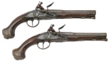 Fine Pair of European Silver-Mounted Flintlock Coat Pistols
