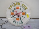 Lighted Golden Sun Feeds Clock