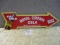 STAMPED ALUMINUM ROYAL CROWN COLA SIGN