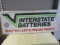 STAMPED ALUMINUM INTERSTATE BATTERIES SIGN
