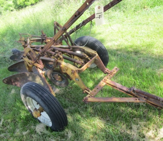 IH 3 bottom plow painted yellow