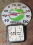 Cargill thermometer and Caterpillar clock