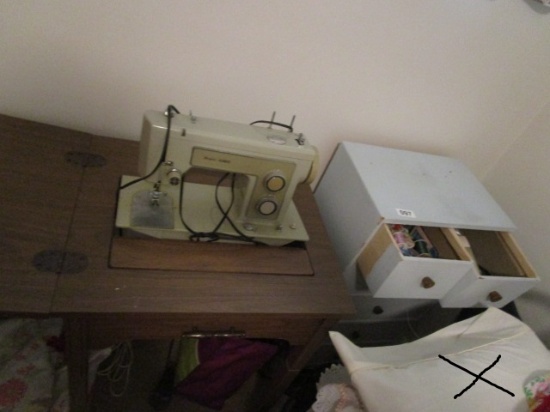 KENMORE SEWING MACHINE AND CABINET OF SUPPLIES AND ACCESORIES