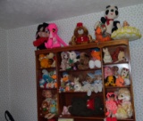 Group of dolls and stuffed animals