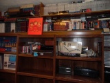 Entertainment center, VHS Tapes, and books