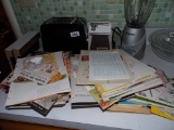 Cookbooks, blender and toaster