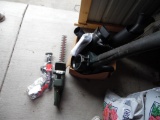 Trimmer, leaf blower, and nozzle