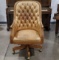 Button Tufted Rustic Leather Swivel Arm Chair