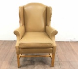 Upholstered Brown Leather Wingback Arm Chair