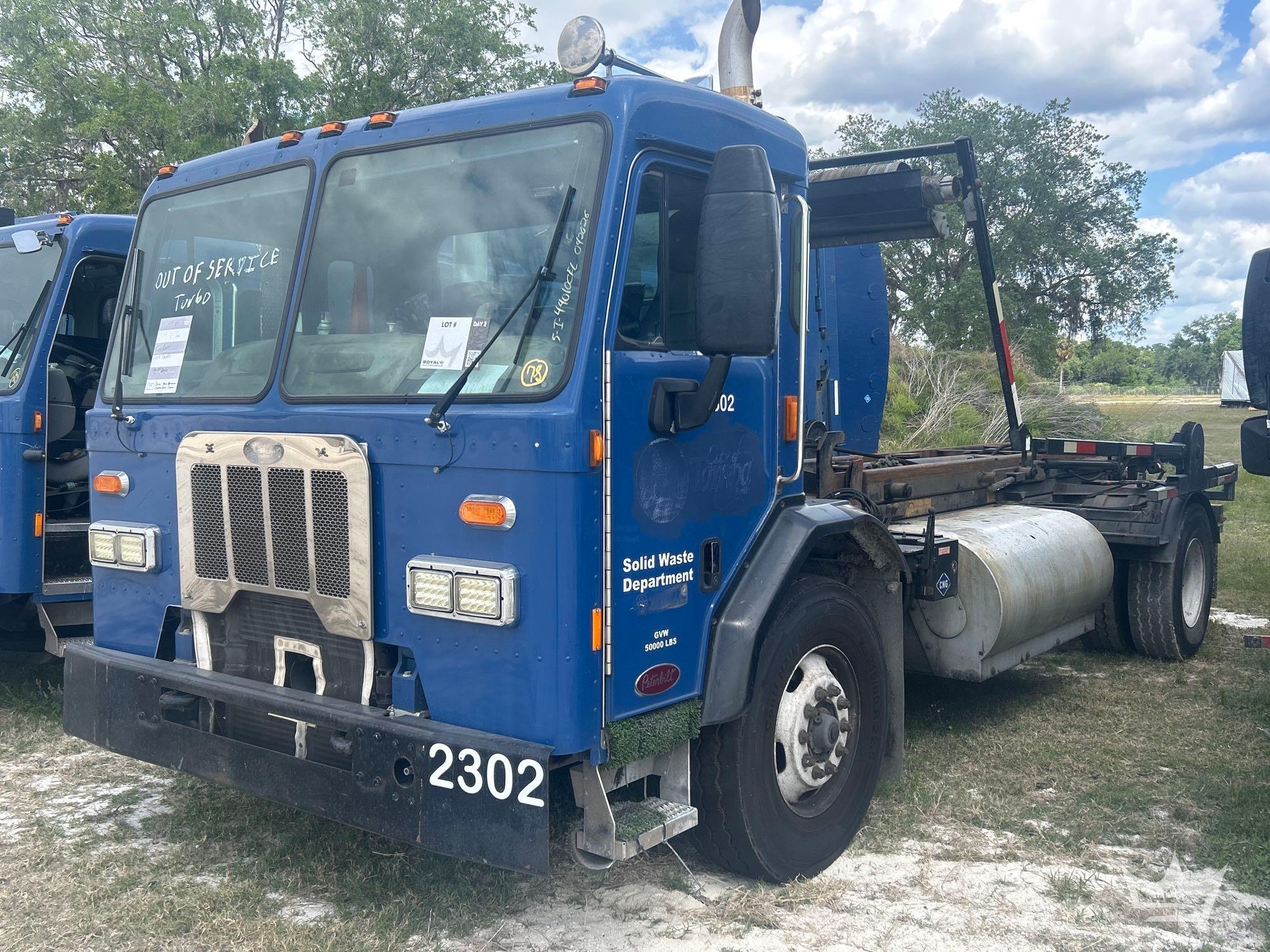 2015 Peterbilt 320 Roll-Off Truck