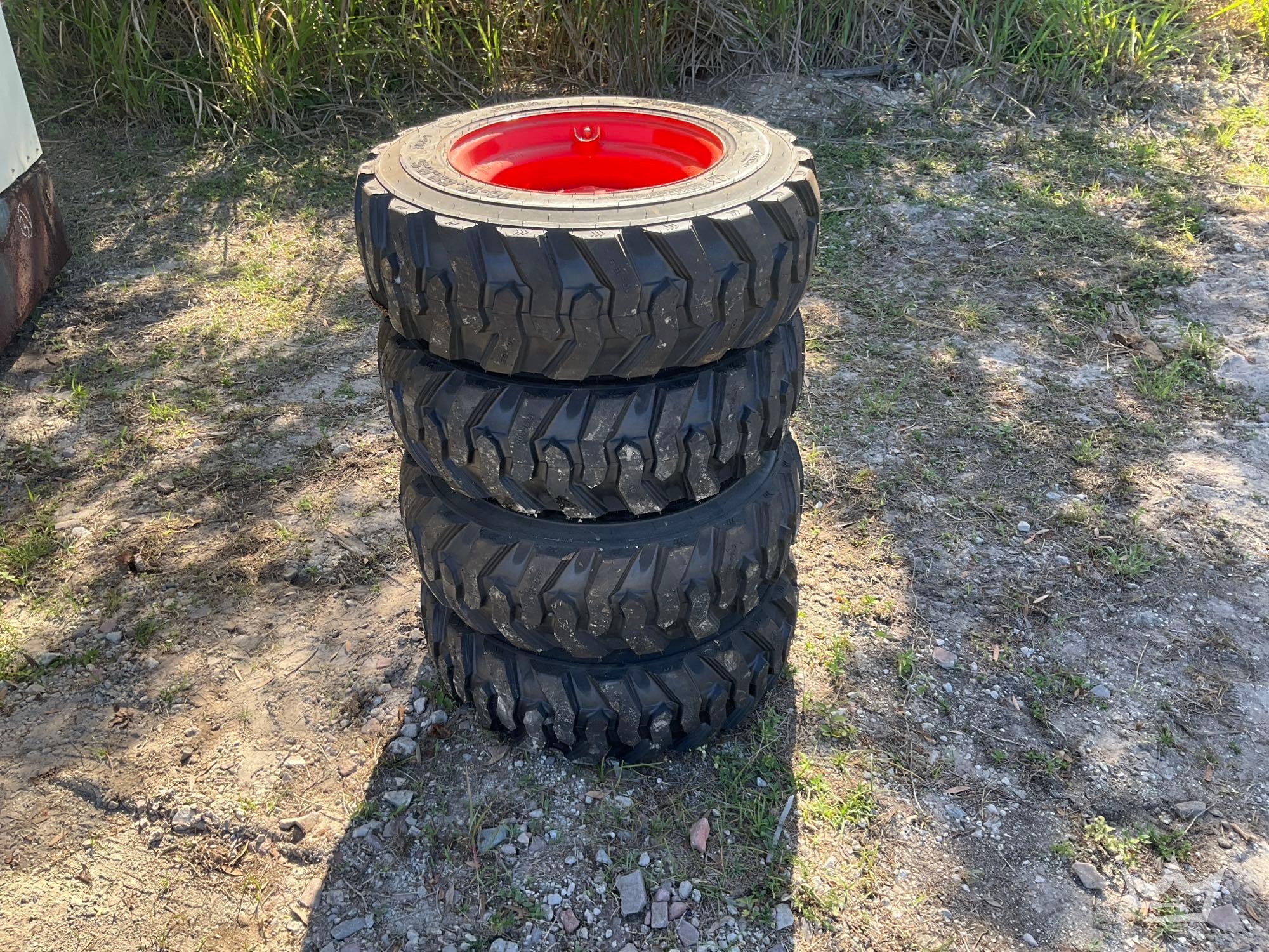 Set of 4 Unused 10-16.5N.H.S. ForeRunner Skid Steer Wheels and Tires