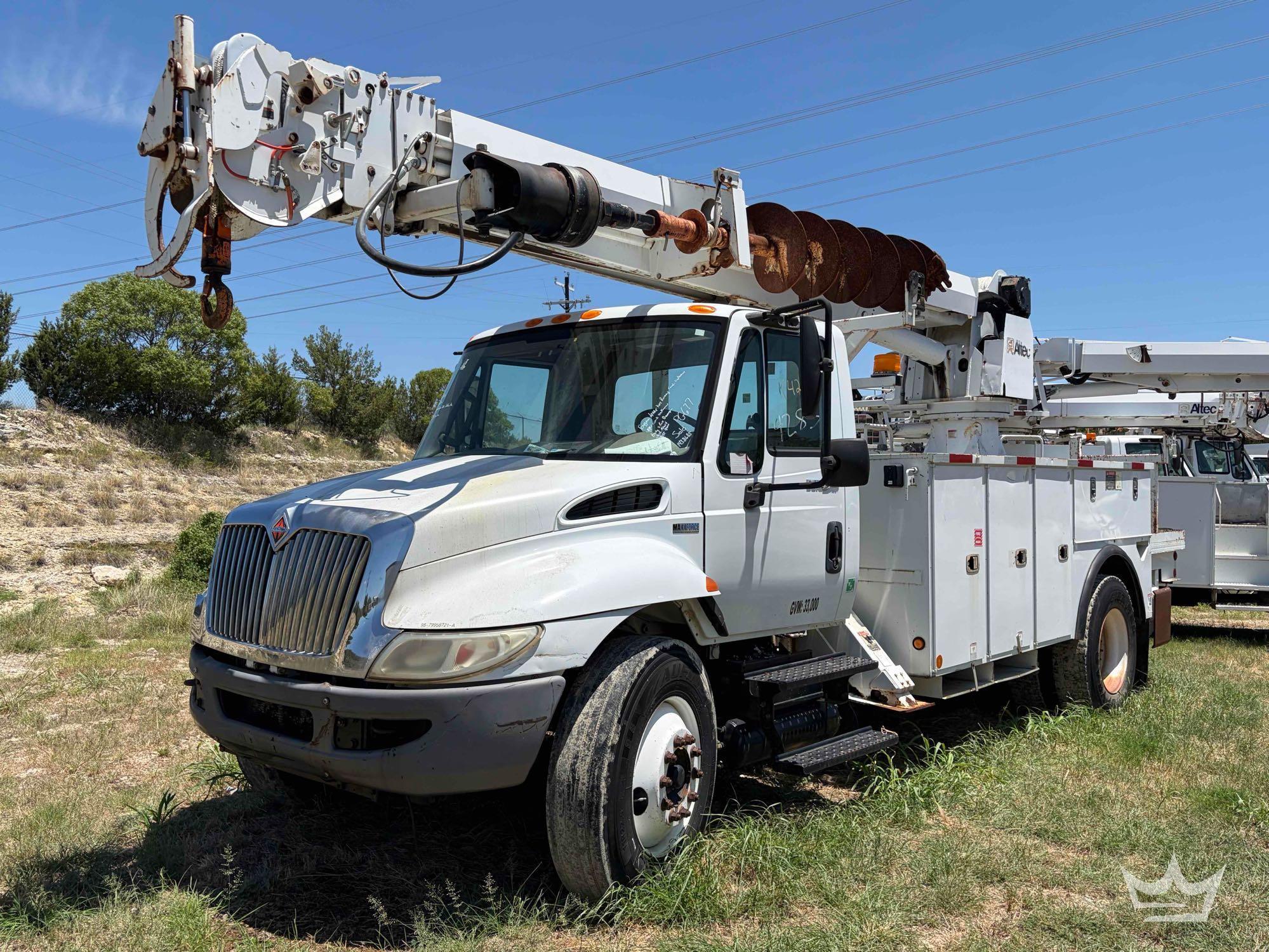 2012 International DuraStar 4300 Altec DM47TR Digger Derrick Truck
