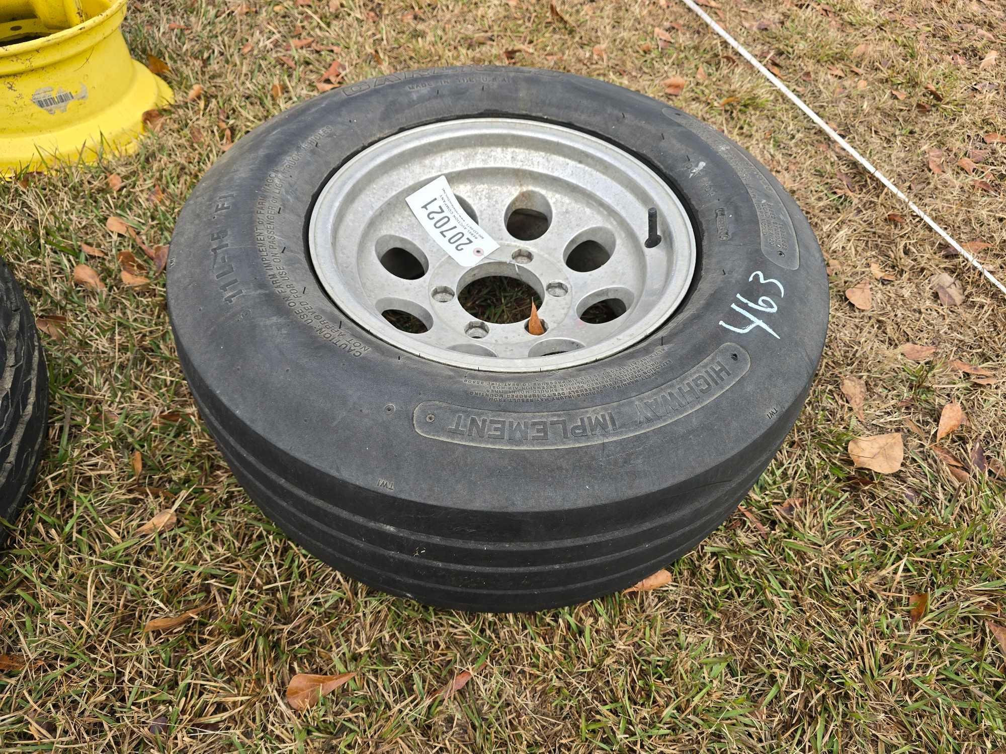 (1) 11L-15 TIRE W/ 6 LUG ALUMINUM RIM