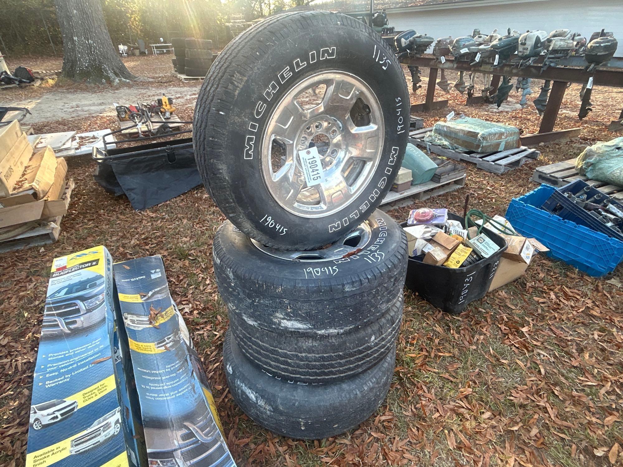 (4) FORD 255/65-17 TIRES W/ 6 LUG RIMS