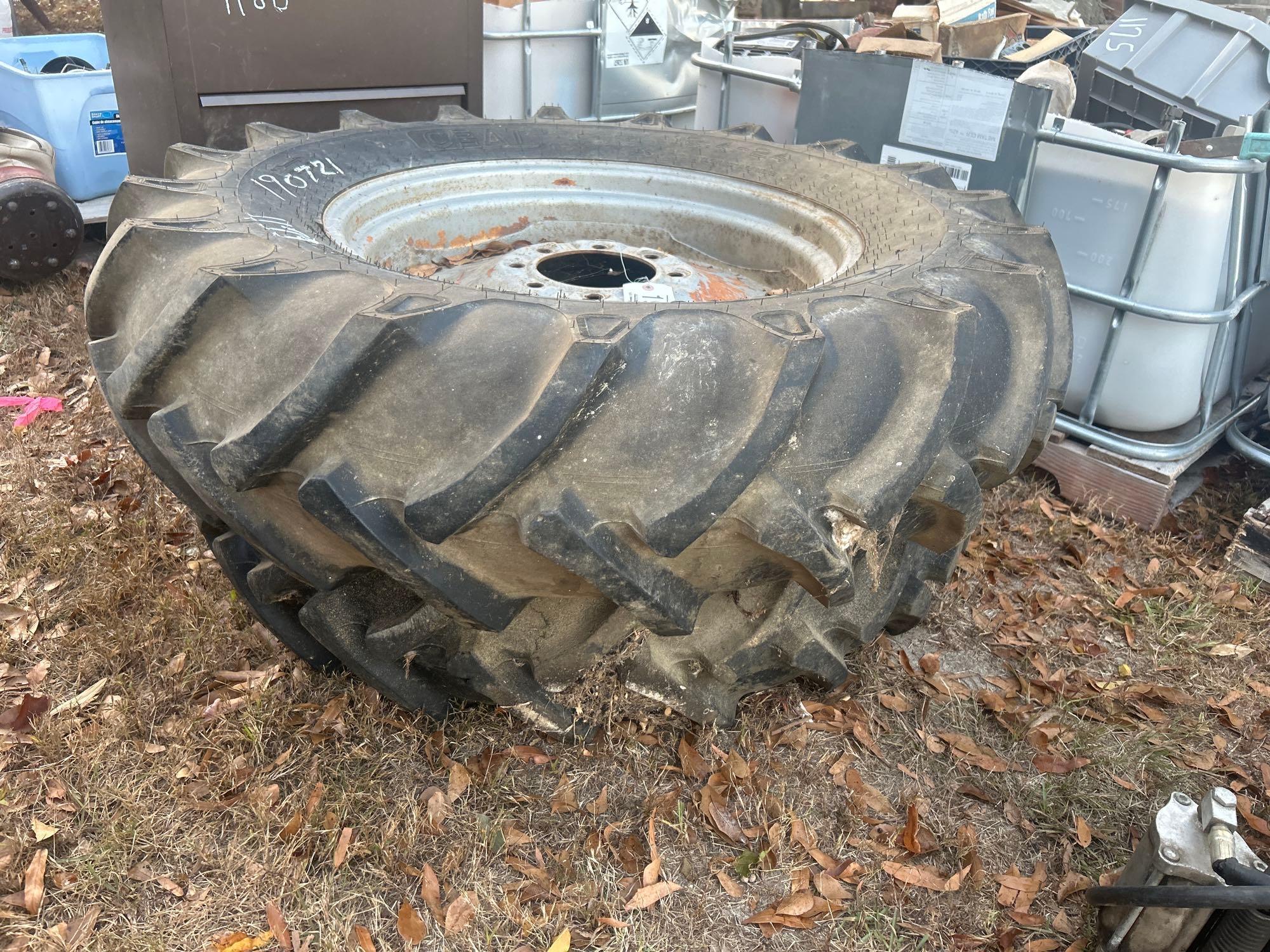 (2) 12.4-24 TIRES W/ 8 LUG RIMS