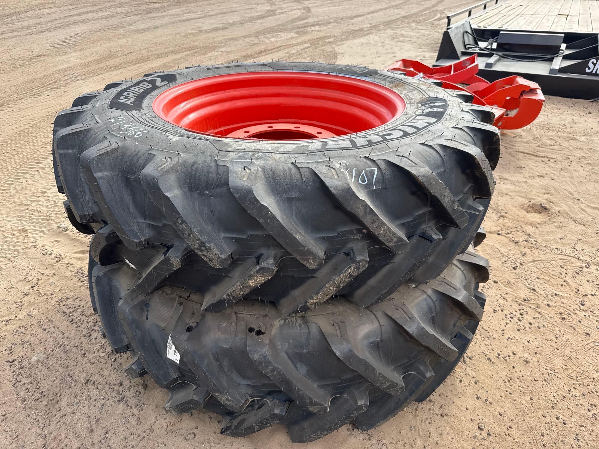 (2) UNUSED 380/85R30 TIRES W/ 10 LUG RIMS