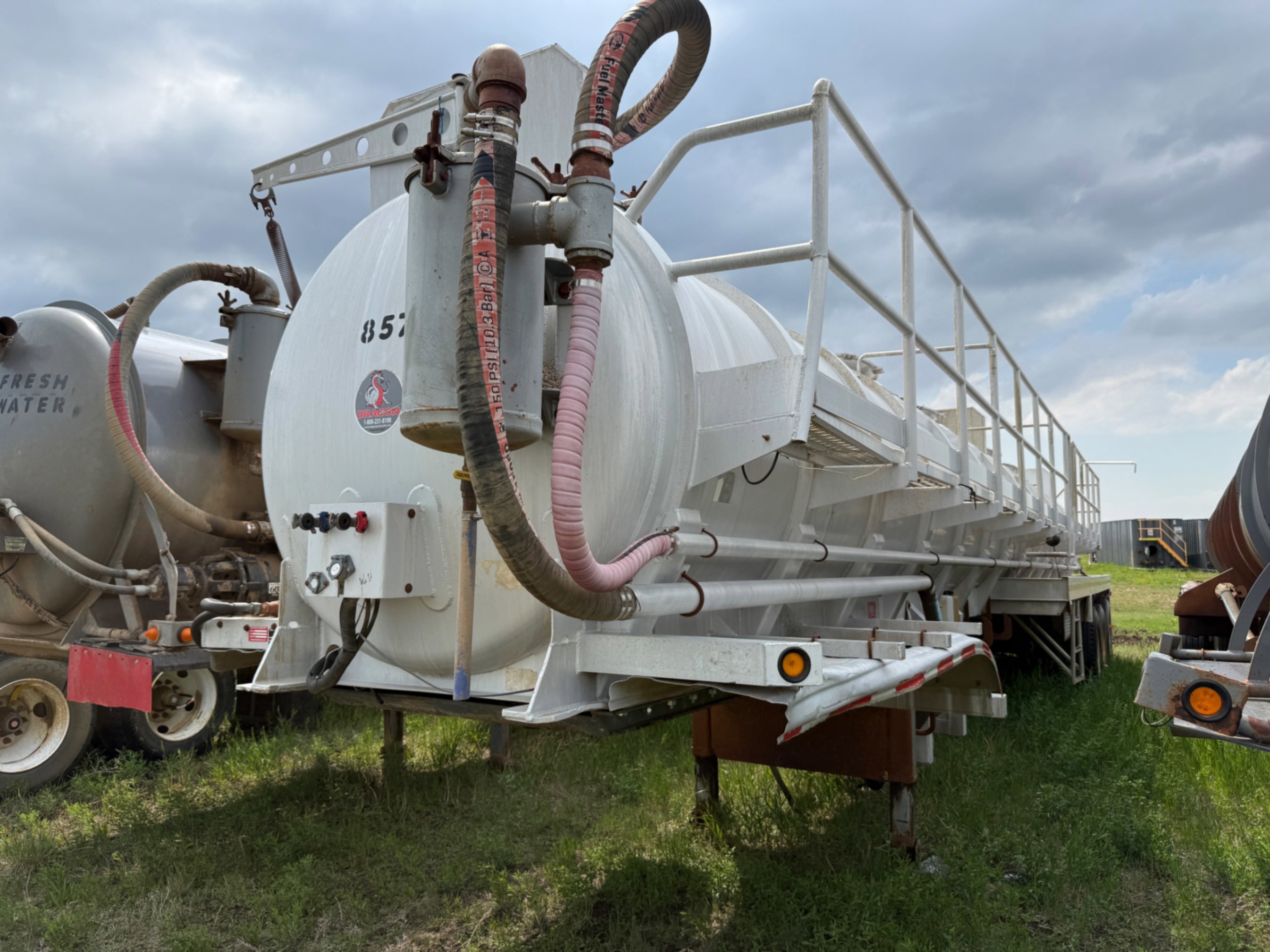 2014 DRAGON TRI-AXLE ALUM VACUUM TRAILER