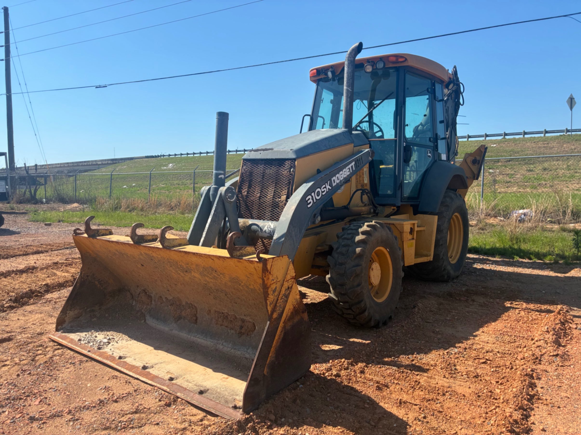 Photo of a 2014 John Deere 310SK