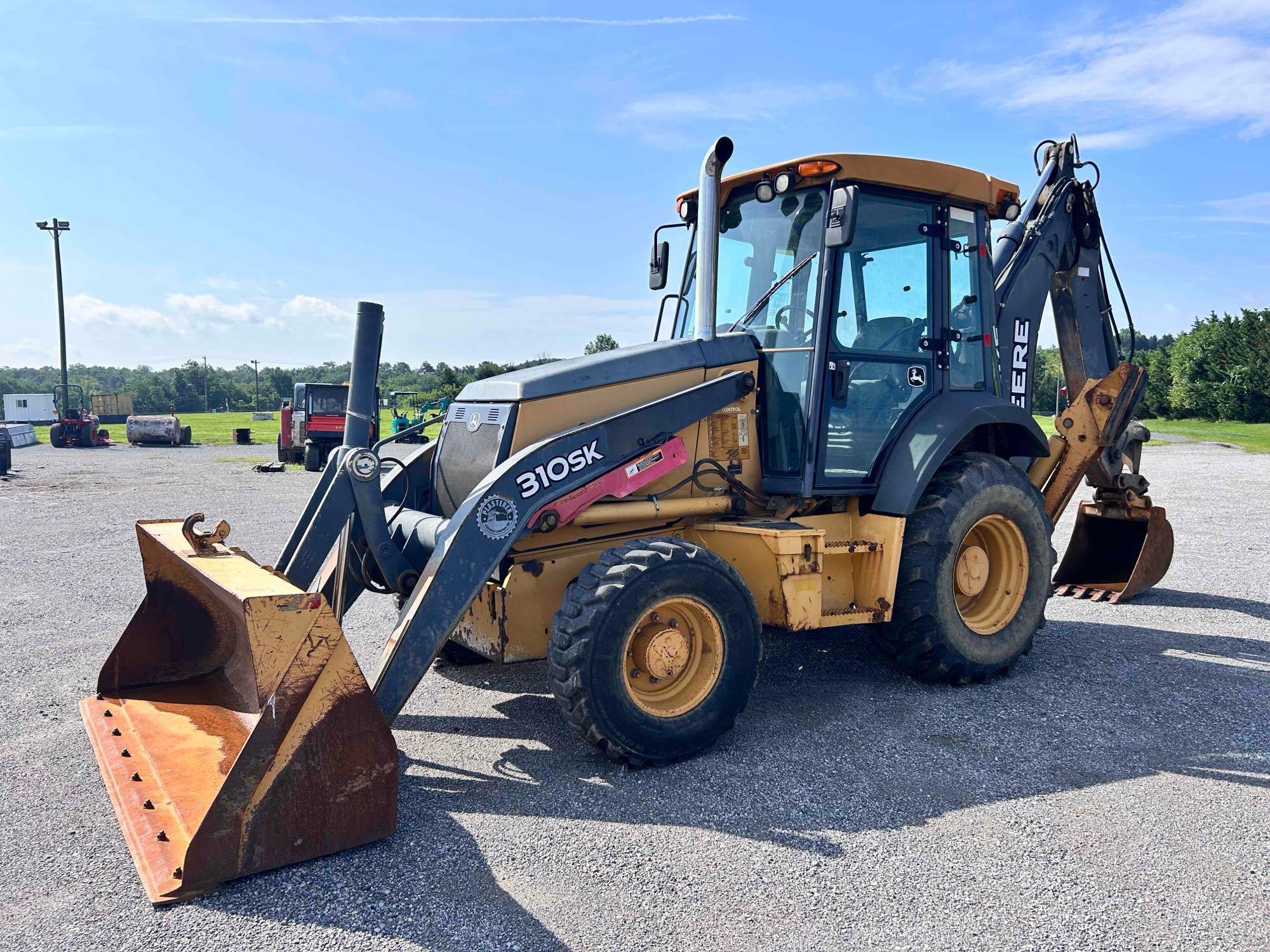 Photo of a 2013 John Deere 310SK